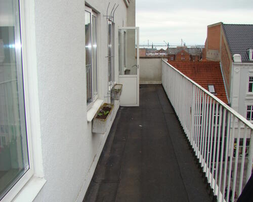 Nyrenoveret penthouselejlighed med tagterrasse i centrum af Fredericia