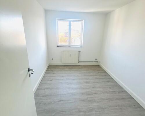 Nyrenoveret penthouselejlighed med tagterrasse i centrum af Fredericia