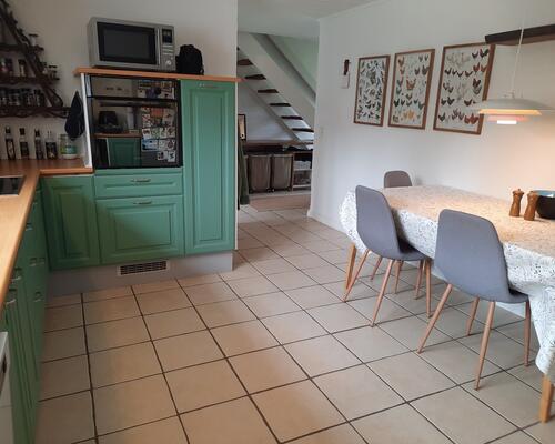 Flot lejlighed beliggende med marker som nabo