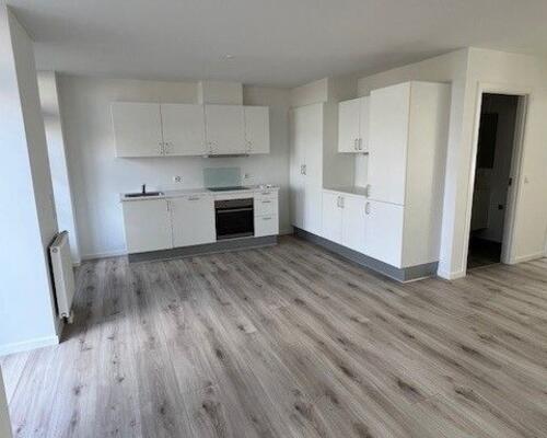 Hyggelig 2'værelses lejlighed med lille østvendt have