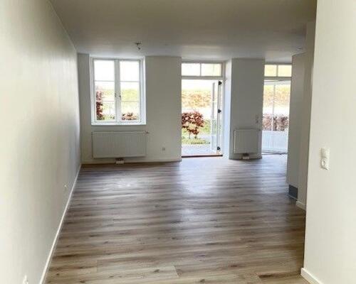 Hyggelig 2'værelses lejlighed med lille østvendt have