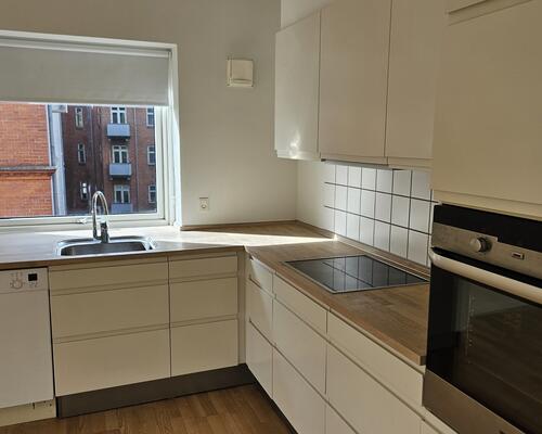 Flot nyistandsat lejlighed central beliggenhed.