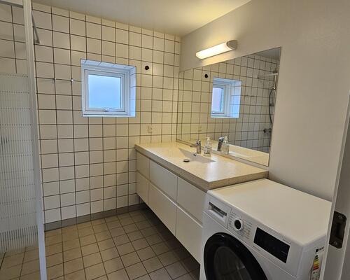 Flot nyistandsat lejlighed central beliggenhed.