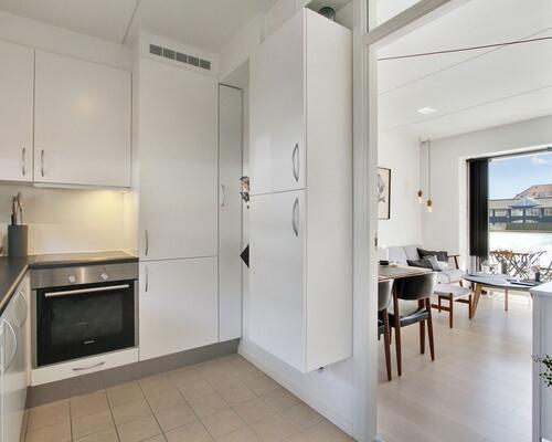 Delevenlig lejlighed med altan og god beliggenhed