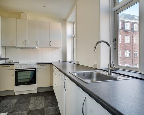 Charmerende og vel indrettet lejlighed!