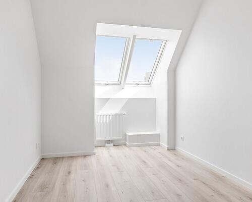 Lækker taglejlighed med altan/tagterrasse.