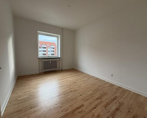 Lys og nyistandsat 4-værelses lejlighed med altan i Horsens