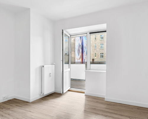 Stor og lys 3-værelses med sydvendt altan, fjordkig og elevator – midt i Aalborg