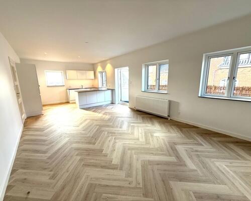 Nyrenoveret penthouselejlighed med tagterrasse i centrum af Fredericia