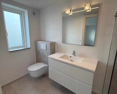 Nyrenoveret penthouselejlighed med tagterrasse i centrum af Fredericia