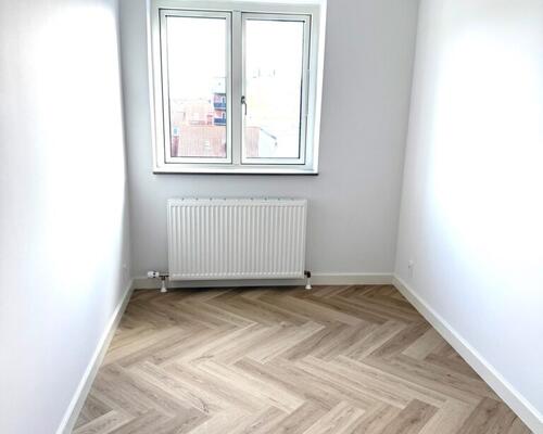 Nyrenoveret penthouselejlighed med tagterrasse i centrum af Fredericia