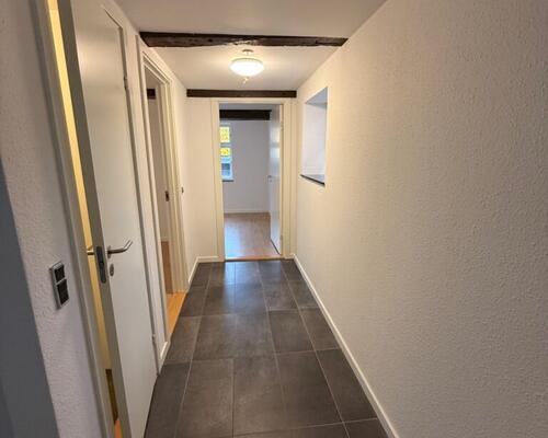 Nyrenoveret lejlighed midt i byen og med direkte adgang til det hyggelige torv