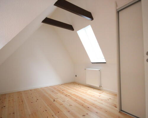 Nyrenoveret lejlighed midt i byen og med direkte adgang til det hyggelige torv