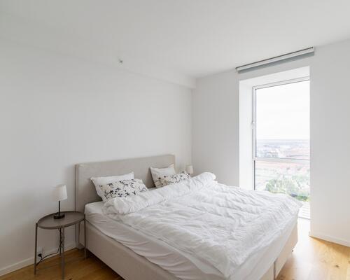 Eksklusiv 4-værelses lejlighed på 32. sal med unik udsigt over København