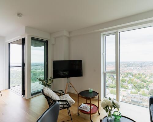 Eksklusiv 4-værelses lejlighed på 32. sal med unik udsigt over København