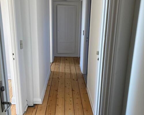 Centralt beliggende med fælles have...