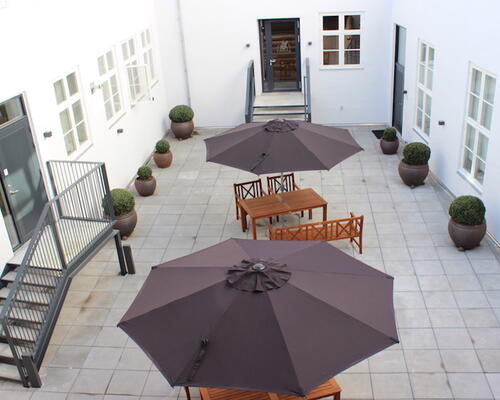 Unik lejlighed med privat altan, i hjertet af København