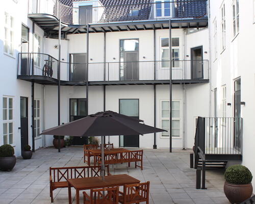 Unik lejlighed med privat altan, i hjertet af København