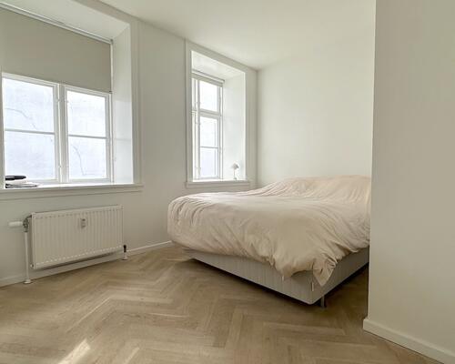 Unik lejlighed med privat altan, i hjertet af København