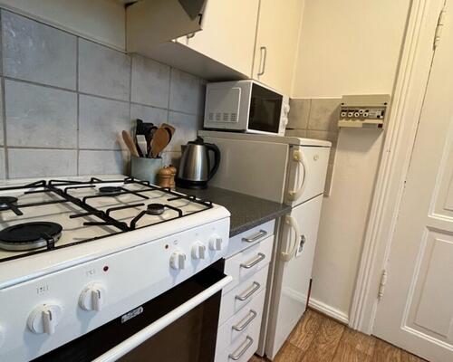 Hyggelig 2-værelses lejlighed med New Yorker-væg