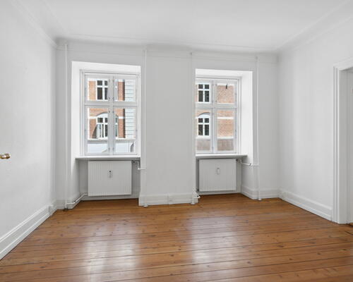 Lys 3-værelses på 89 m2 med altan – 2 minutters gang til gågade og havnefront