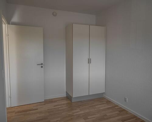 Dejlig lys lejlighed med altan