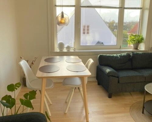 Charmerende 2-værelses lejlighed i enestående ejendom