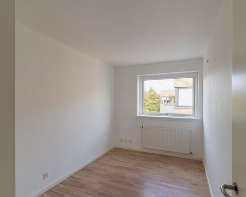 Rummeligt rækkehus i familievenligt kvarter i Ålsgårde