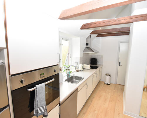 Eksklusiv taglejlighed med loft til kip i Aalborg