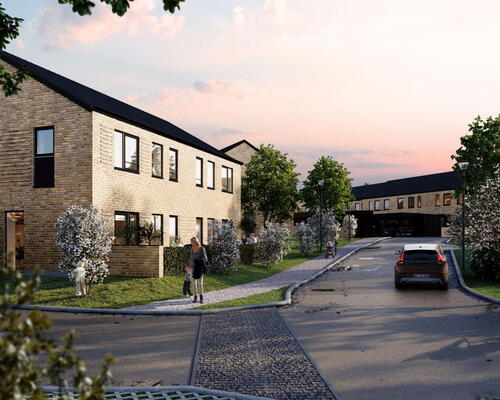 Lyst 4-værelses rækkehus på 115 m2 med to terrasser og carport – tæt på AAU i Sønder Tranders