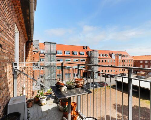 Lejlighed med stor altan, nyt køkken og nyt bad i Jyllandsgade