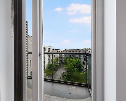 Dejlig 2-værelses lejlighed i Bryggerhaven med altan