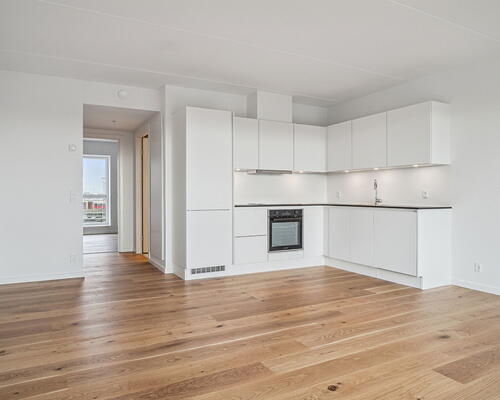 Moderne og veludnyttet 2-værelses lejlighed, med gulvarme i alle rum og altan ud mod gården - Ingen bindingsperiode!