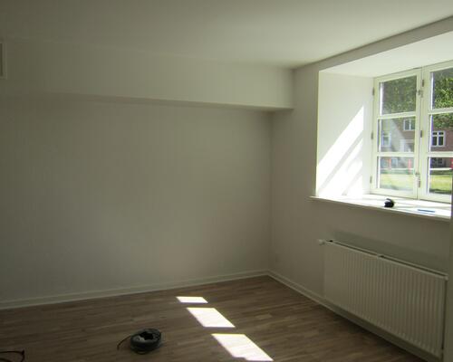 Lækker renoveret kælderlejlighed