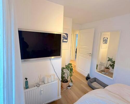 Renoveret 2-værelses lejlighed med altan