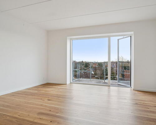 Moderne og veludnyttet 2-værelses lejlighed, med gulvarme i alle rum og altan ud mod gården - Ingen bindingsperiode!