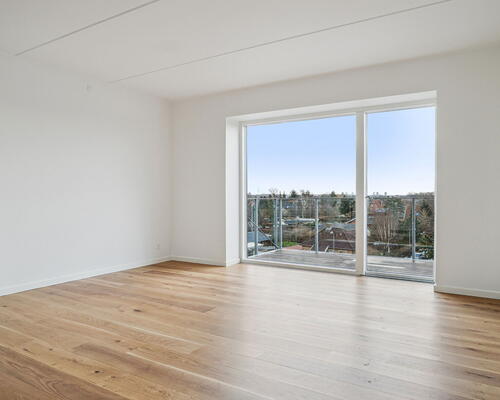 Moderne og veludnyttet 2-værelses lejlighed, med gulvarme i alle rum og altan ud mod gården - Ingen bindingsperiode!