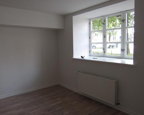 Lækker renoveret kælderlejlighed