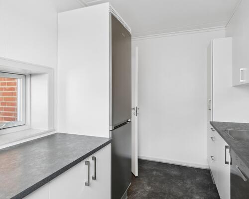 Vil du bo centralt i Vejle i en nyrenoveret lejlighed?