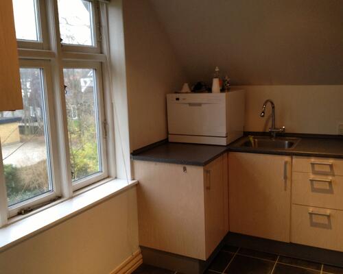 Flot og velholdt lejlighed i hyggelige omgivelser