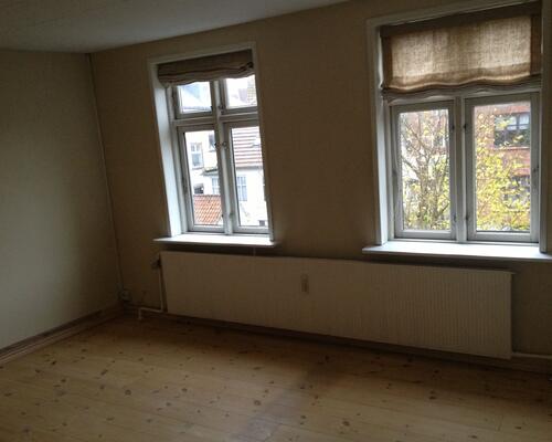 Flot og velholdt lejlighed i hyggelige omgivelser