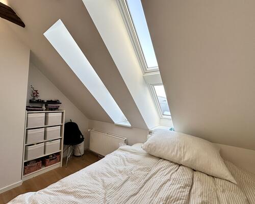 Hyggelig 1-værelses lejlighed med charme og lysindfald