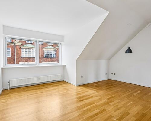 Lys og centralt beliggende 3-værelses lejlighed i Haslev