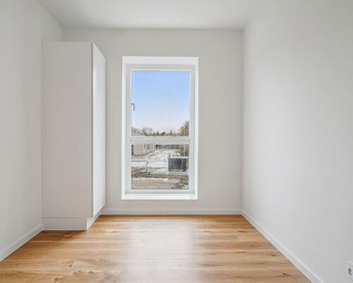 Rummelig og stilren 3-værelses lejlighed med stort køkken-alrum og stor altan ud til gården - Gulvarme i hele boligen!