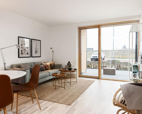 Moderne bolig med tre værelser og privat terrasse. Skræddersyet til dig over 50 år uden hjemmeboende børn