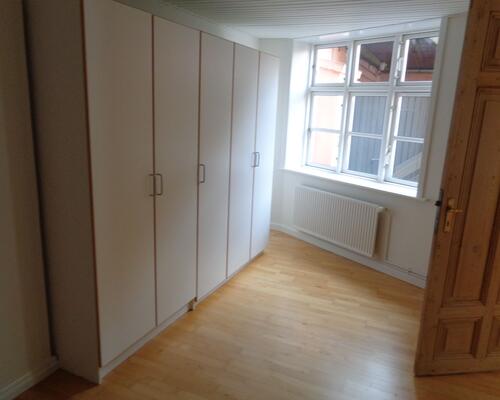 Dejlig lejlighed i stueplan, beliggende i Bisgaarden