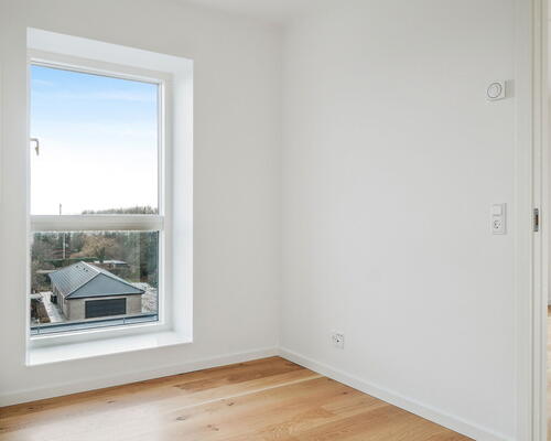 Indbydende 3-værelses lejlighed med funktionel indretning, moderne køkken-alrum og hyggelig terrasse ud mod gården - Ingen bindingsperiode!