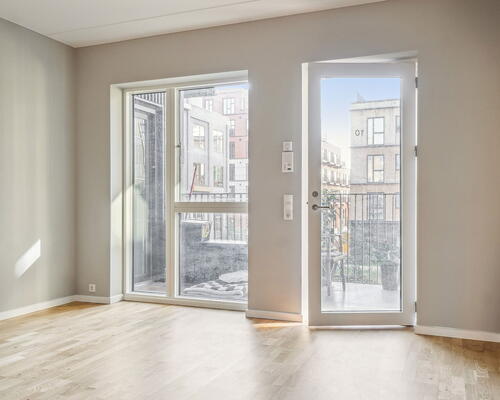 2 vær bolig i UN17 Lunden - et bofællesskab for dig over 40 år - Hyggelig stue og køkken-alrum i åben forbindelse