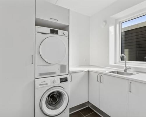 Dejligt rækkehus i tre plan!