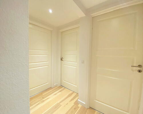 Charmerende 5-værelses taglejlighed med synlige bjælker og stor altan